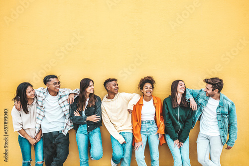 Leinwand Poster Happy multiracial friends standing over isolated background - Cheerful young peo