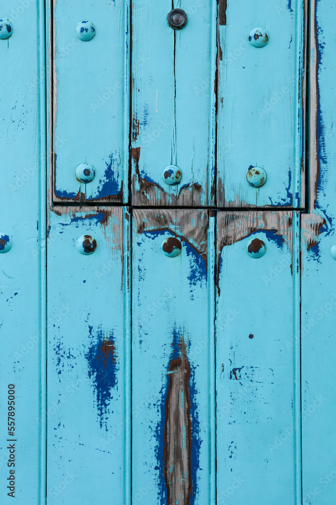 Background of Old Blue wooden door in Spain Background of Old Blue wooden door in Spain