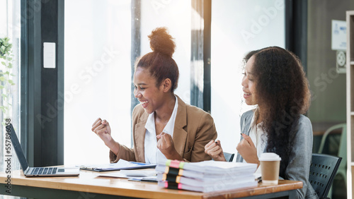 An African American businesswoman participates in a staff meeting and working together at workplace.