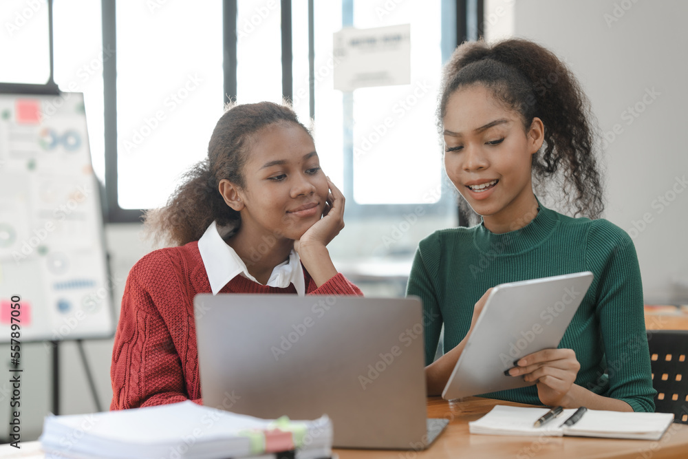 African American girls students studying up for test or making homework together, Back to school concept. African American girls students studying up for test or making homework together, Back to school concept.