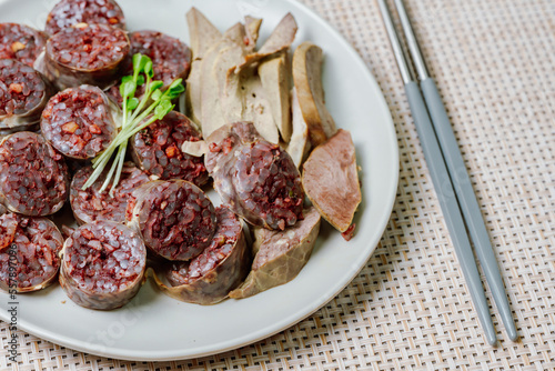 Sundae, Korean Blood Sausage : Pork intestines stuffed with glass noodles, vegetables, sweet rice, coagulated pig's blood (seonji) and steamed. Variations include Ojingeosundae (stuffed squid) and cha