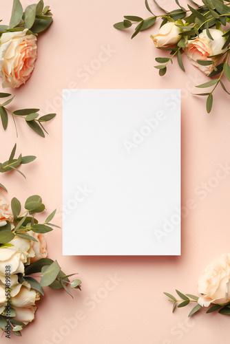 Blank wedding invitation or save the date card mockup with fresh roses flowers