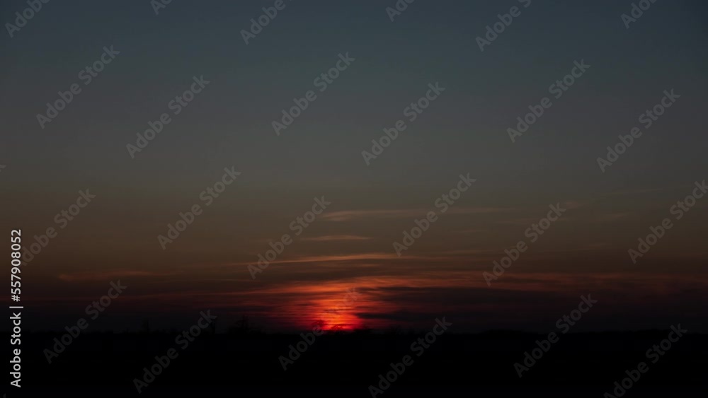 Sunset, Time Lapse of Bright Yellow Sunset Sun Moving Across Cloudy Sky Background Sunset, Time Lapse of Bright Yellow Sunset Sun Moving Across Cloudy Sky Background