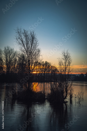 Winter sunrise on river © ghostdom