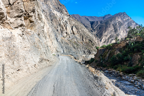 a road in the mountains carved in the rock