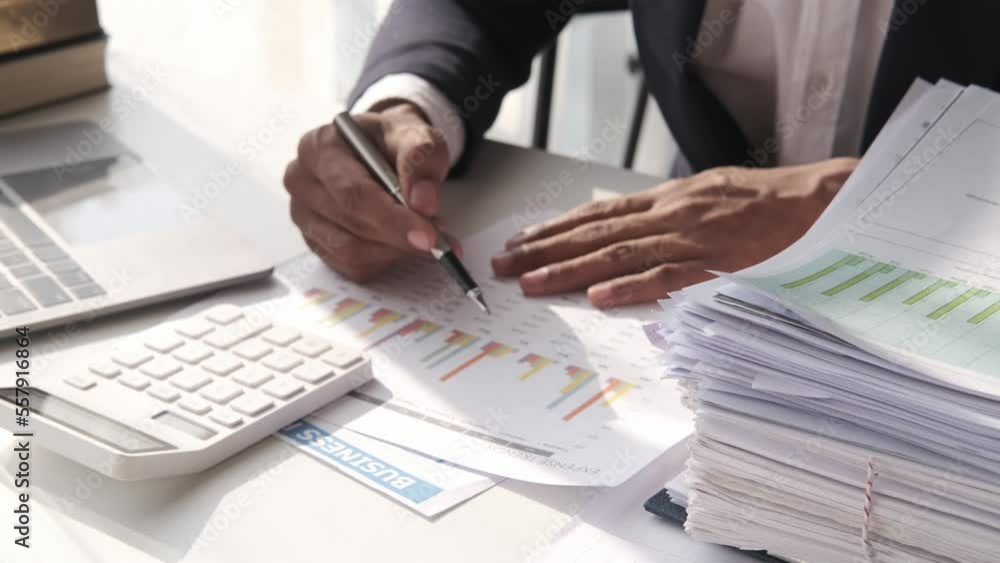 Business people read business statistics chart reports, to analyze and improve corporate strategy, manager financial and marketing documents. Business people read business statistics chart reports, to analyze and improve corporate strategy, manager financial and marketing documents.