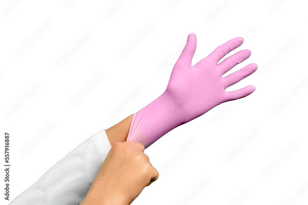 The doctor puts a protective medical glove on his hand, isolated on a white background The doctor puts a protective medical glove on his hand, isolated on a white background