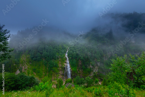 Ayder Plateau Foggy Forest And Natural Waterfall (turkish; Gelintulu Waterfall) From Rize - Turkey photo