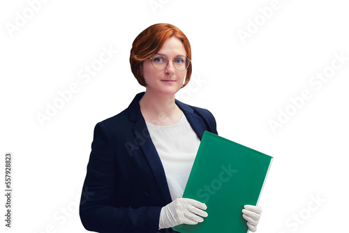 Woman teacher holds a green folder while standing near the school blackboard, copy space, isolated on a white background