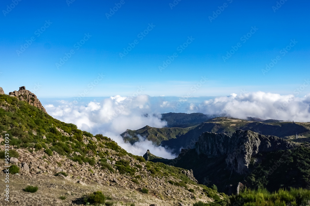Clouds over the peak in Madeira island	
