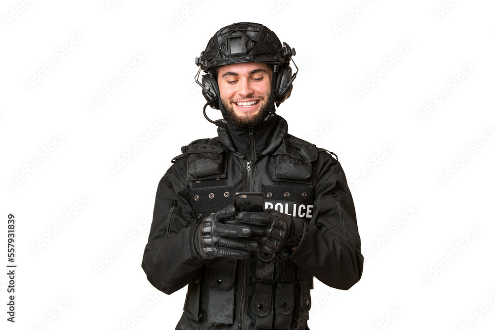 SWAT over isolated chroma key background sending a message with the mobile SWAT over isolated chroma key background sending a message with the mobile