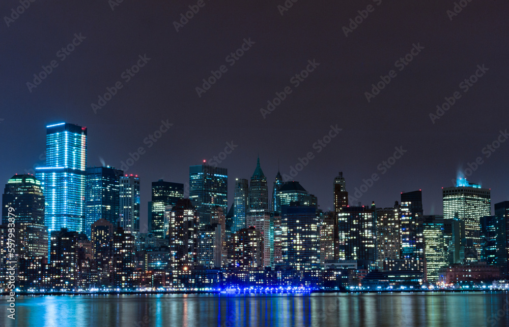 Hudson River and Night Cityscape of New York. Manhattan. NYC, USA. Reflection on Water Hudson River and Night Cityscape of New York. Manhattan. NYC, USA. Reflection on Water