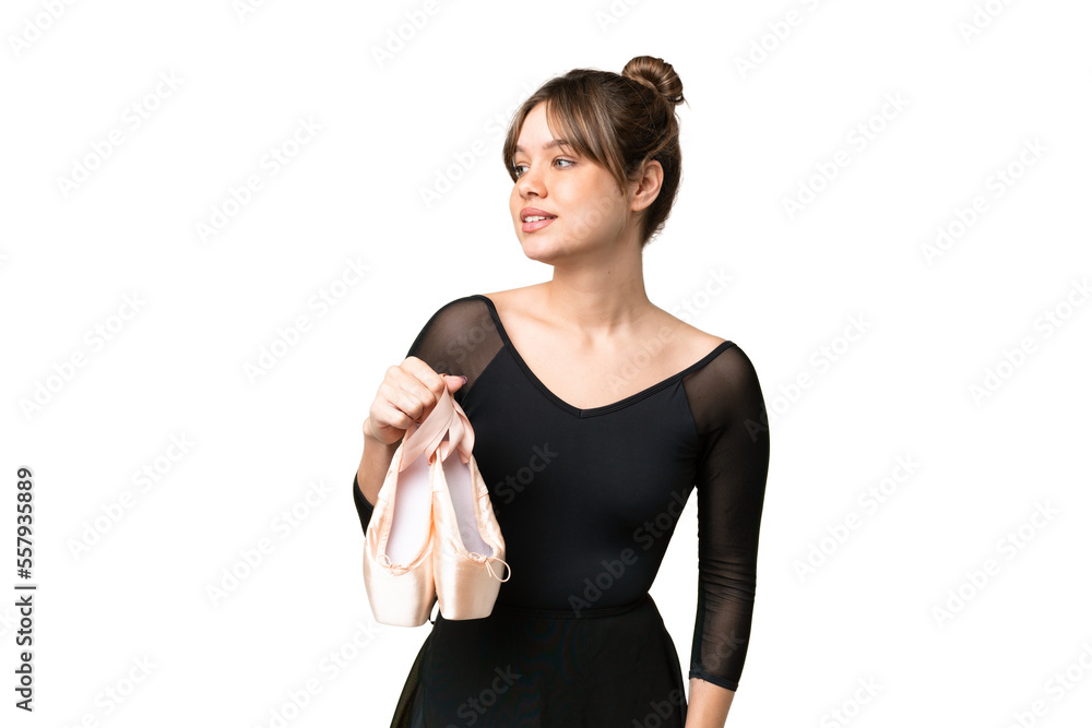 Young girl practicing ballet over isolated chroma key background looking to the side and smiling Young girl practicing ballet over isolated chroma key background looking to the side and smiling