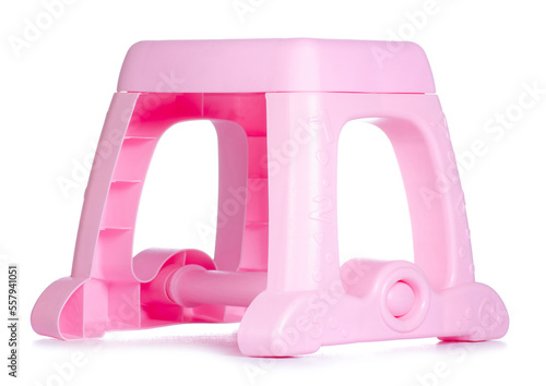 Pink children's plastic chair on white background isolation