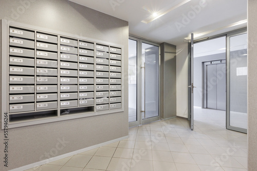 mailboxes in the lobby of an apartment building