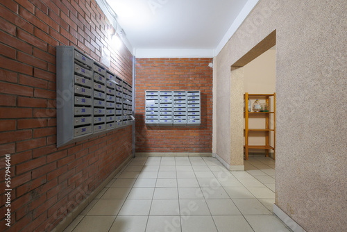 mailboxes in the lobby of an apartment building