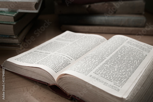 Close-up of an old book open to a random page