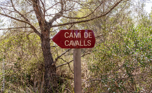 A path sign on the Cami de Cavalls coastal walk in Minorca island.