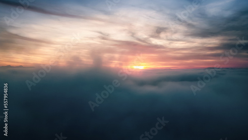 above the clouds at sunrise 