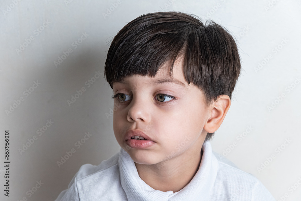 Cute boy with white shirt on white background Cute boy with white shirt on white background