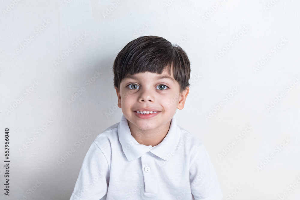 Cute boy with white shirt on white background Cute boy with white shirt on white background
