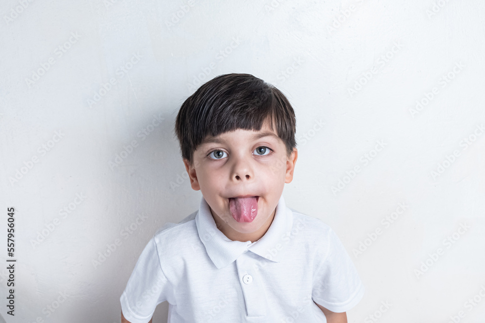Cute boy with white shirt on white background Cute boy with white shirt on white background