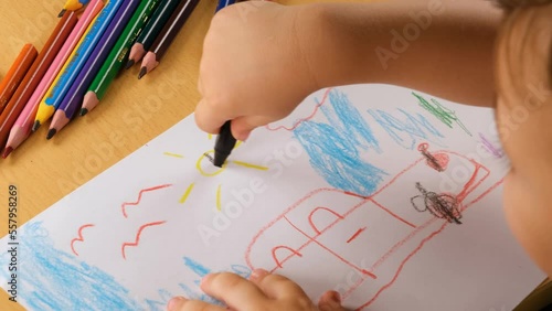 little kid painting car