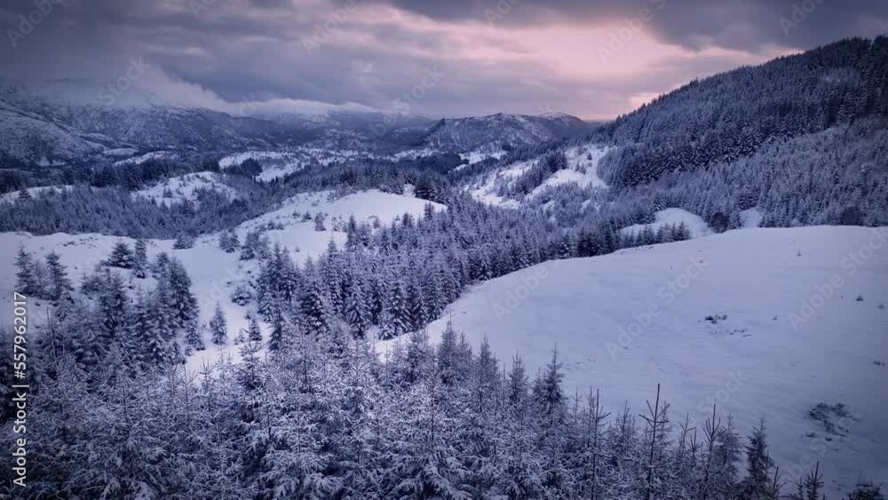 Beautiful winter landscape with mountains and woods in sunset Beautiful winter landscape with mountains and woods in sunset