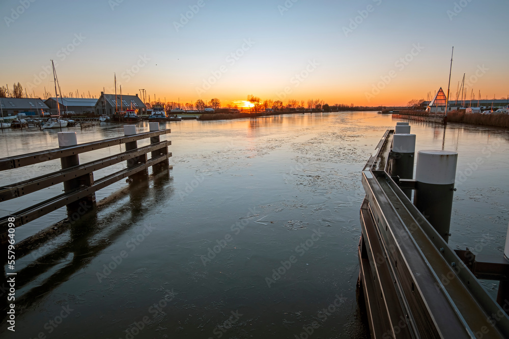 Fototapeta premium Sunset in the countryside from Friesland in the Netherlands