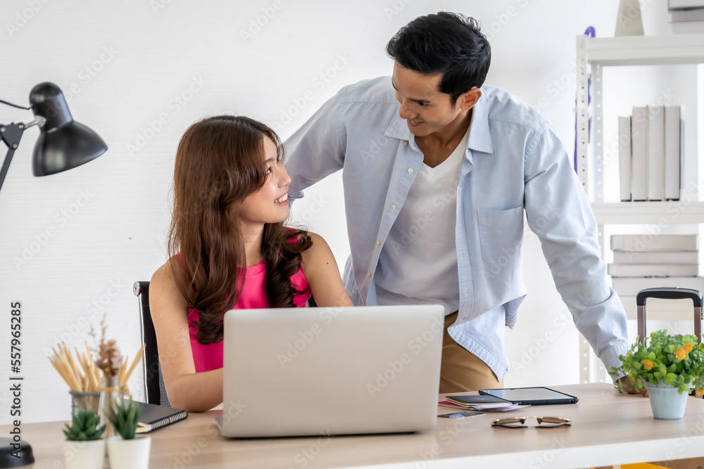 Asian couples are preparing to travel together both domestically and internationally. Have a good travel plan through the Internet. Both of them are happy and excited about going on a trip together. Asian couples are preparing to travel together both domestically and internationally. Have a good travel plan through the Internet. Both of them are happy and excited about going on a trip together.