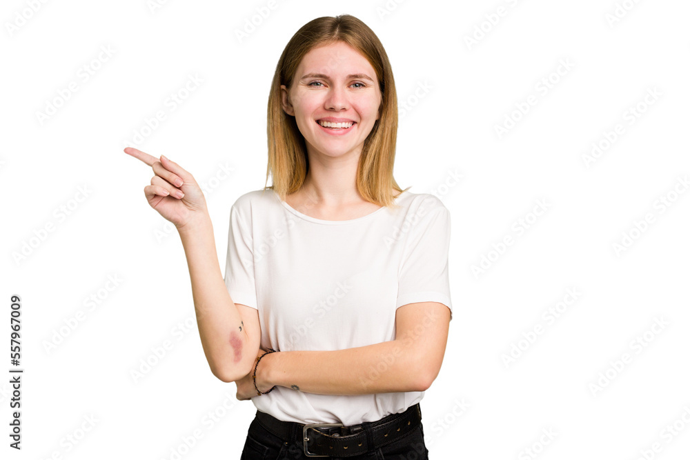 Young caucasian woman isolated smiling cheerfully pointing with forefinger away. Young caucasian woman isolated smiling cheerfully pointing with forefinger away.