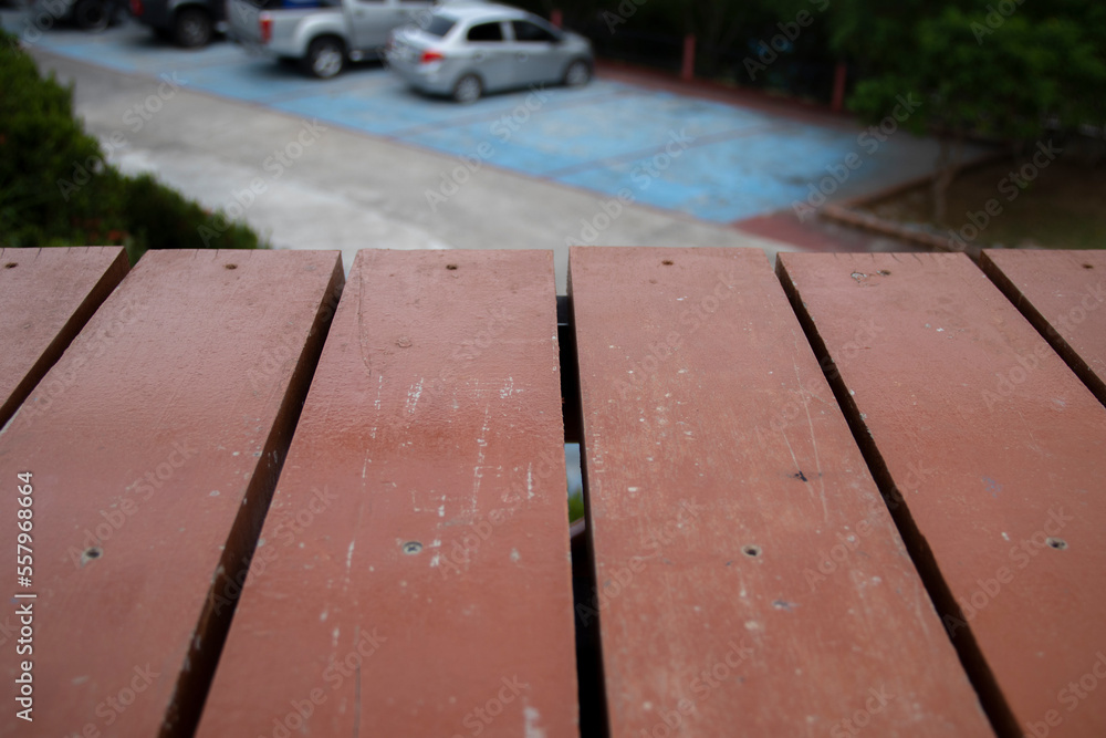 empty wooden table on the parking background