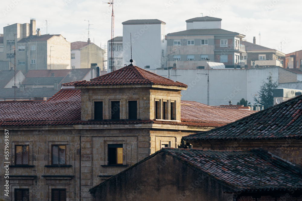 Telephoto photograph of a residential area in the historic center of the small Castilian city of Salamanca. View at early morning