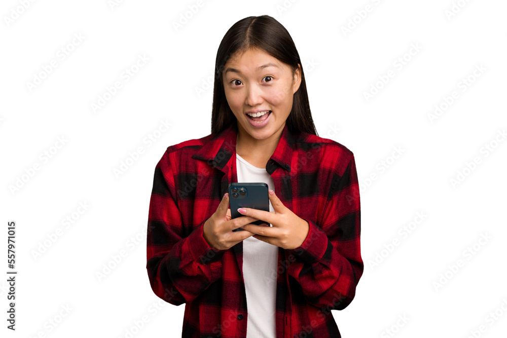 Young asian woman holding a mobile phone isolated Young asian woman holding a mobile phone isolated