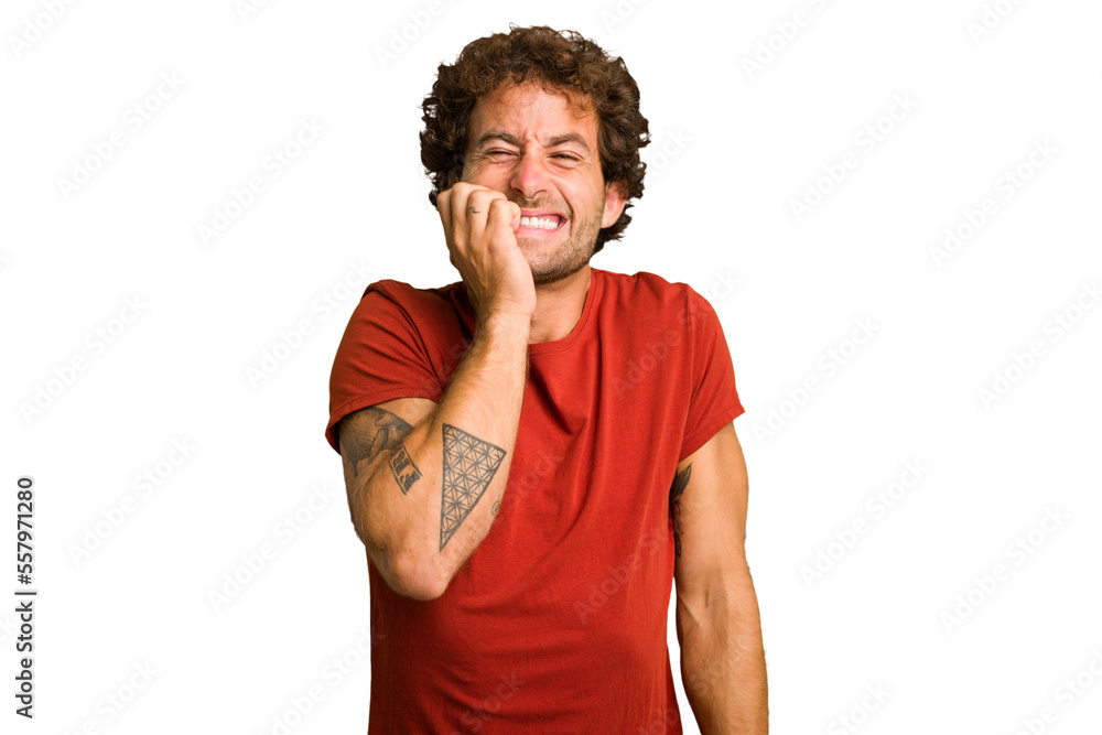 Young curly smart caucasian man cut out isolated biting fingernails, nervous and very anxious. Young curly smart caucasian man cut out isolated biting fingernails, nervous and very anxious.