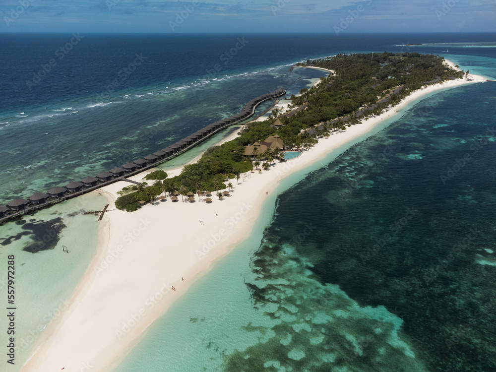Maldives paradise scenery. Tropical aerial landscape, seascape with long jetty, water villas with amazing sea and lagoon beach, tropical nature.
