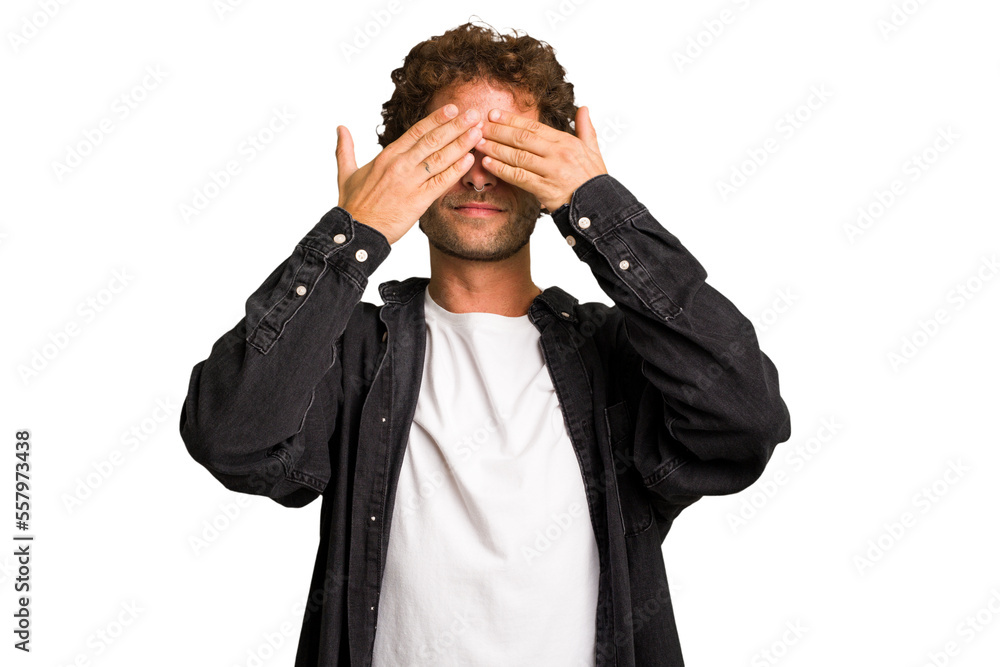 Young curly smart caucasian man cut out isolated afraid covering eyes with hands. Young curly smart caucasian man cut out isolated afraid covering eyes with hands.