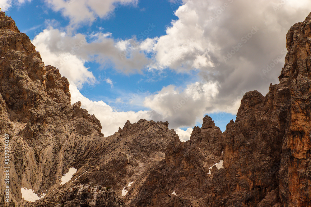 clouds over the mountains in dolomites