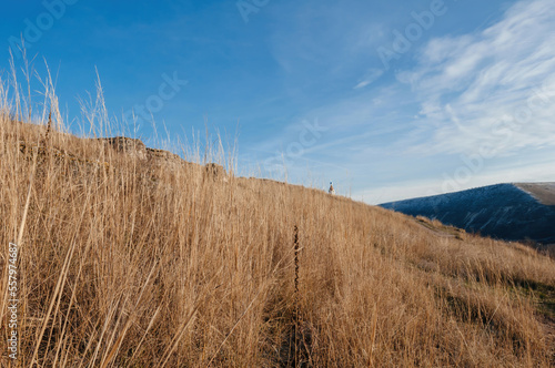 Hills with dry grass in Orheiul Vechi Region, Republic of Moldova photo
