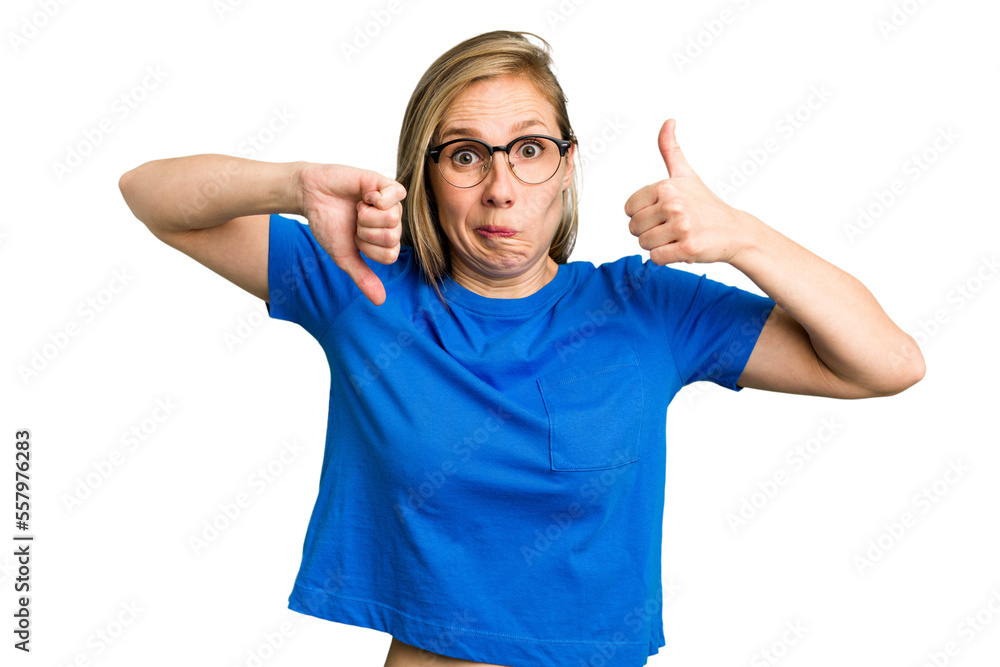 Young caucasian woman cutout isolated showing thumbs up and thumbs down, difficult choose concept Young caucasian woman cutout isolated showing thumbs up and thumbs down, difficult choose concept
