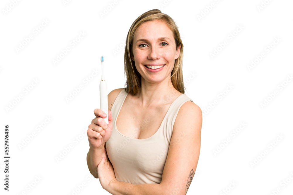 Young caucasian holding a brushing teeth isolated Young caucasian holding a brushing teeth isolated