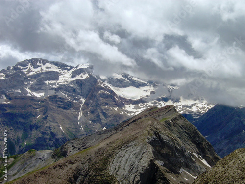 mountainous landscape of the Spanish Pyrenees. lots of green vegetation and high mountains. photo