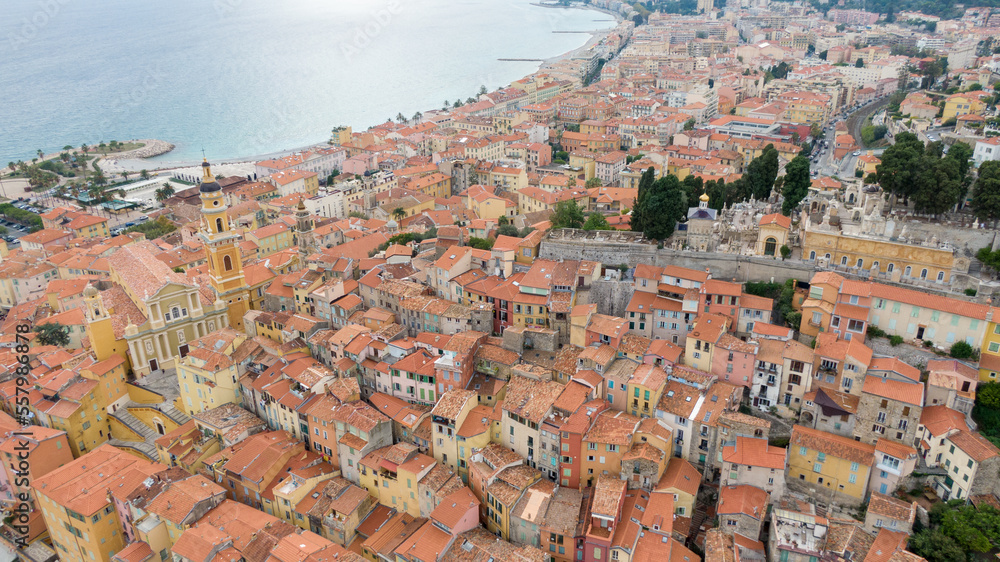 Aerial view on coast and buildings in old Town Menton, France. Drone photo. High angle view of town