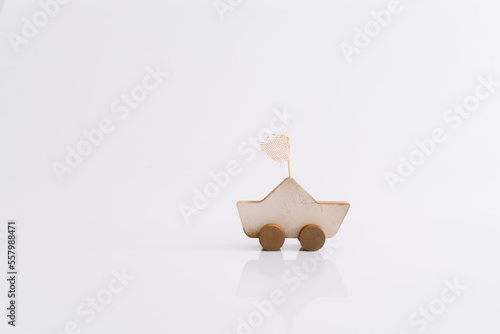 Vintage ship toy shown on a white background