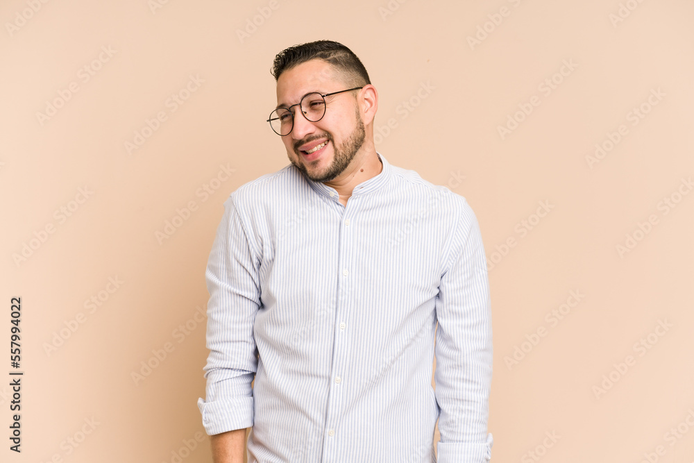 Adult latin man cut out isolated laughs and closes eyes, feels relaxed and happy. Adult latin man cut out isolated laughs and closes eyes, feels relaxed and happy.