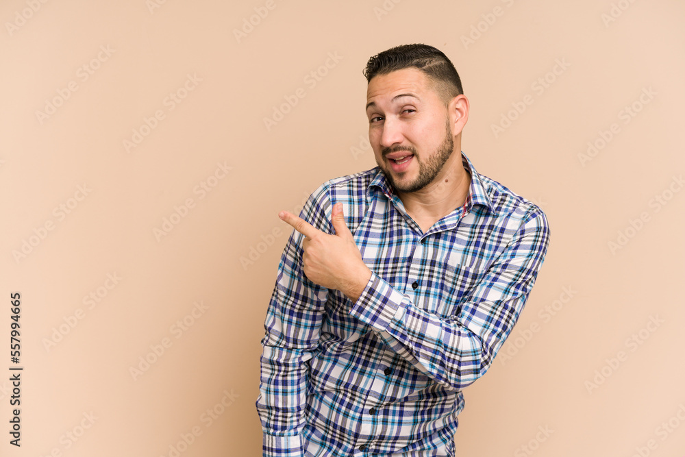 Adult latin man cut out isolated looks aside smiling, cheerful and pleasant. Adult latin man cut out isolated looks aside smiling, cheerful and pleasant.