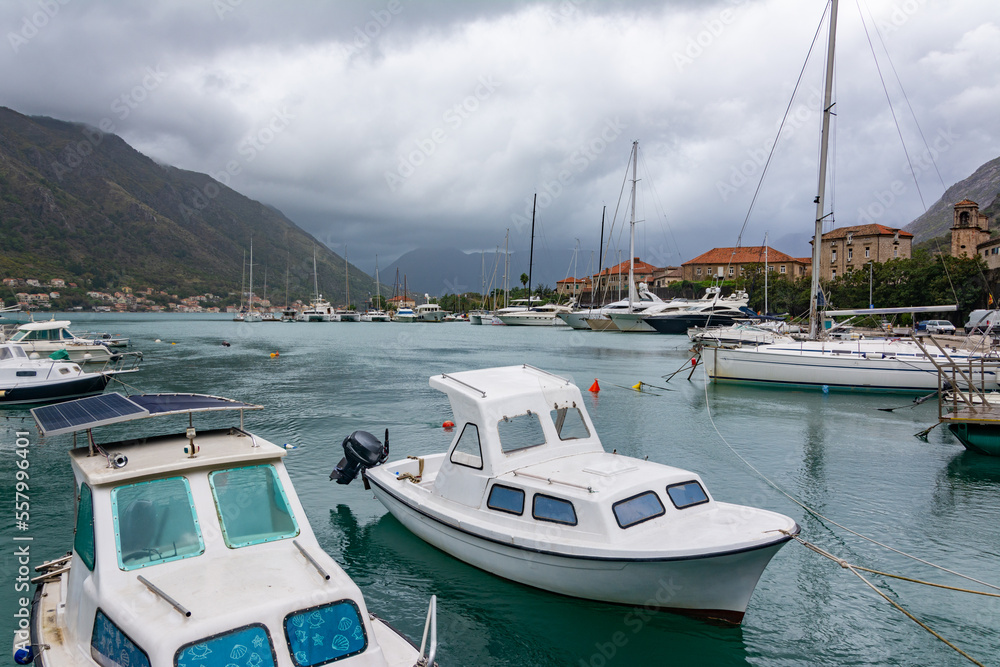 Fototapeta premium Several yachts and boats are moored at the pier in the Mediterranean Sea.