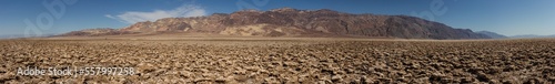Wrinkle, dry ground Badwater basin with mountains backround in Death Valley national park