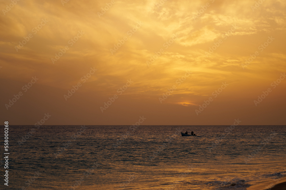 A colorful sunset on the Atlantic coast on the island of Sal in Cape Verde.