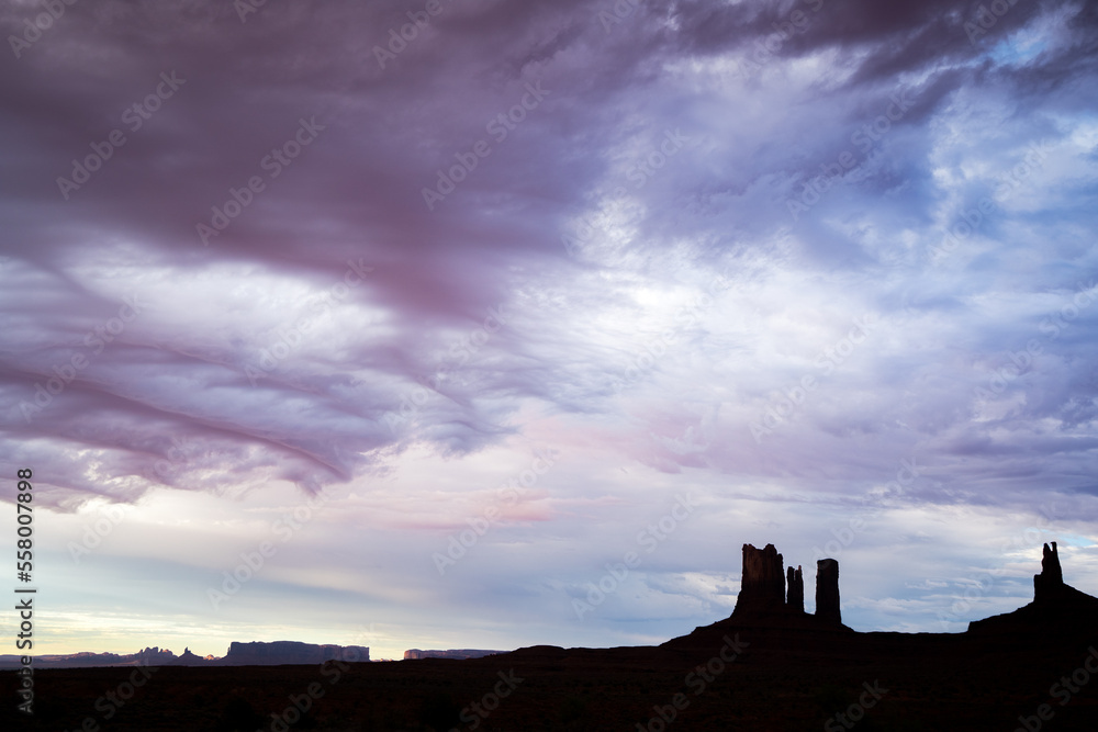 colorful sky in the desert of monument valley 